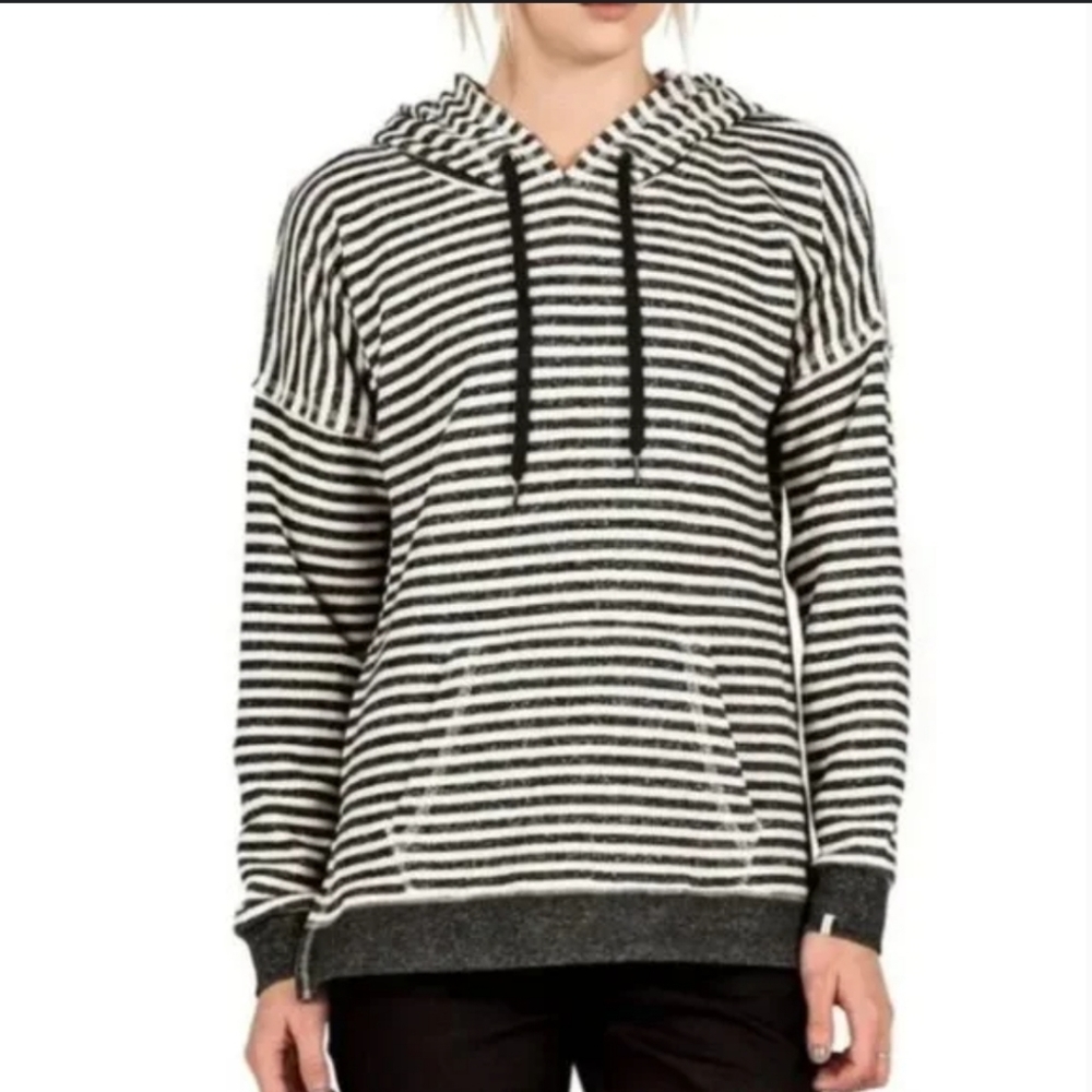 Volcom lived in woman's small navy blue and white  striped hoodie.
